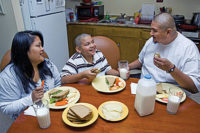 Family eating lunch with milk